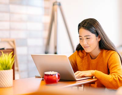 Woman on laptop at home